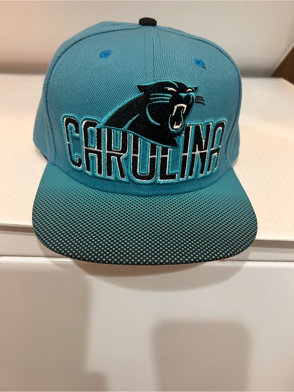 Carolina Panthers Adjustable Mitchell & Ness Snapback Hat
